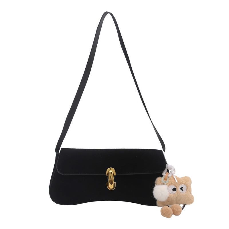 Elegant Suede Handbag with Playful Keychain