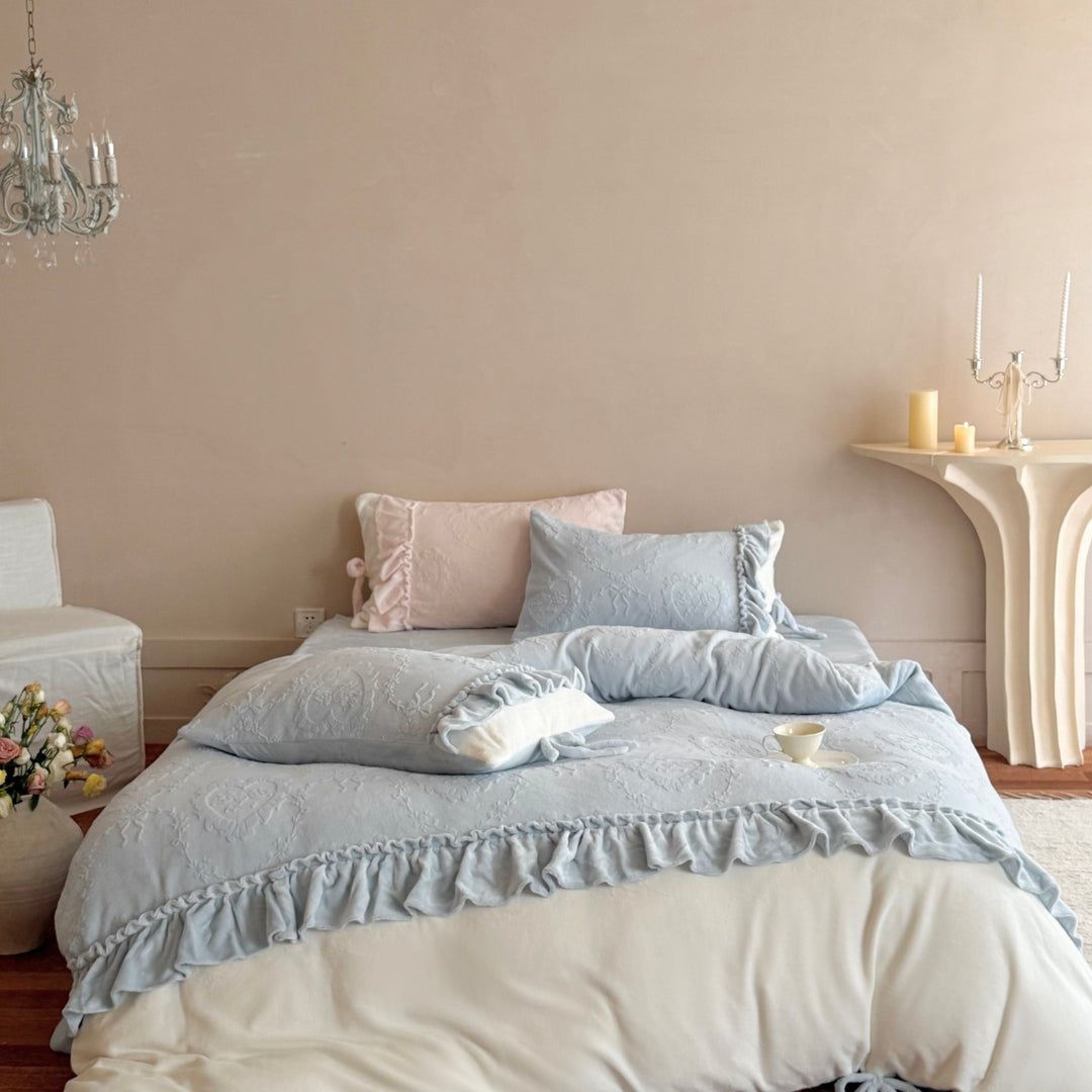 Romantic cotton satin bedding set with ruffled hem and fine tone-on-tone embroidery