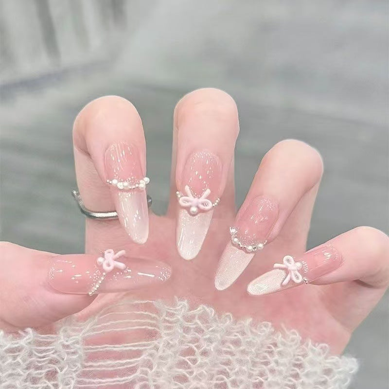 Elegant Stiletto Nail Art Tips with Pearl Accents