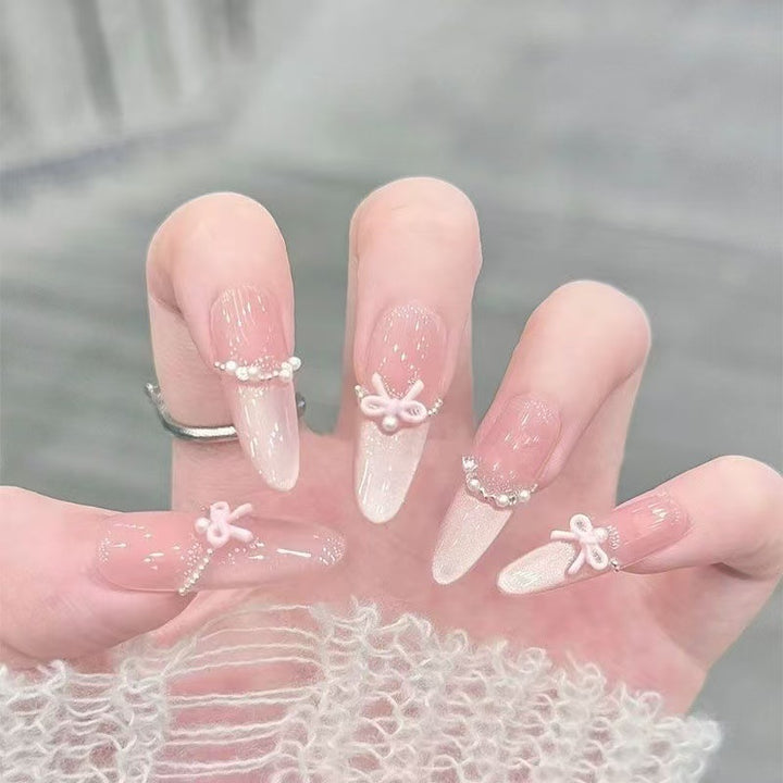 Elegant Stiletto Nail Art Tips with Pearl Accents