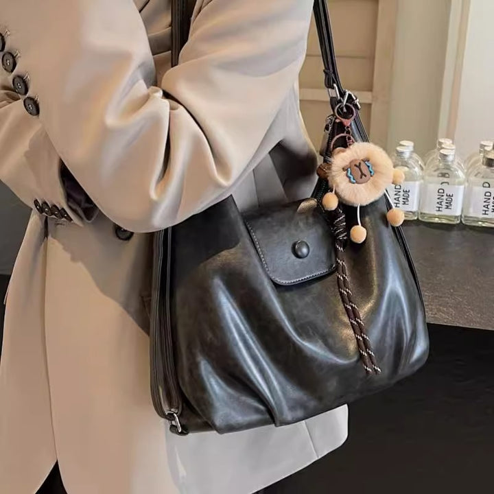 Modern shoulder bag with practical flap closure Kalsten