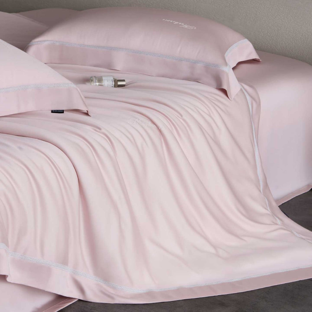 Silky-smooth cotton satin bedding set with fine decorative ribbon and pillowcases
