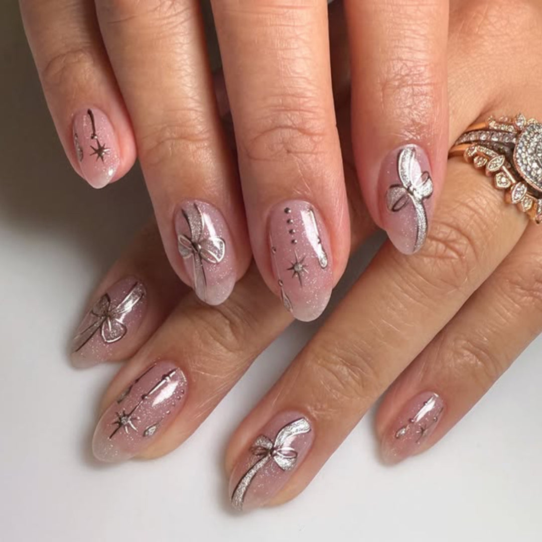 Artificial nail art with playful dots and bows Kalsten