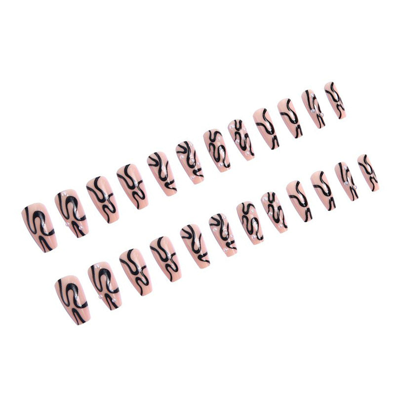 Artificial nail set with unique wave designs and glamorous accents Kalsten
