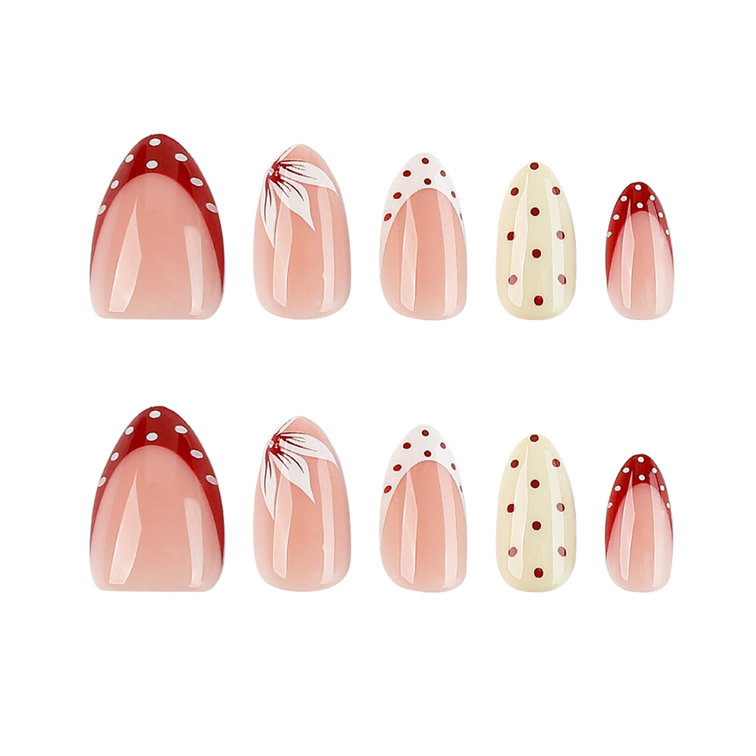 Artistic nail design with unique dots and floral embellishments Kalsten