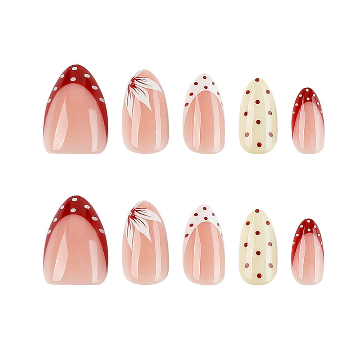 Artistic nail design with unique dots and floral embellishments Kalsten