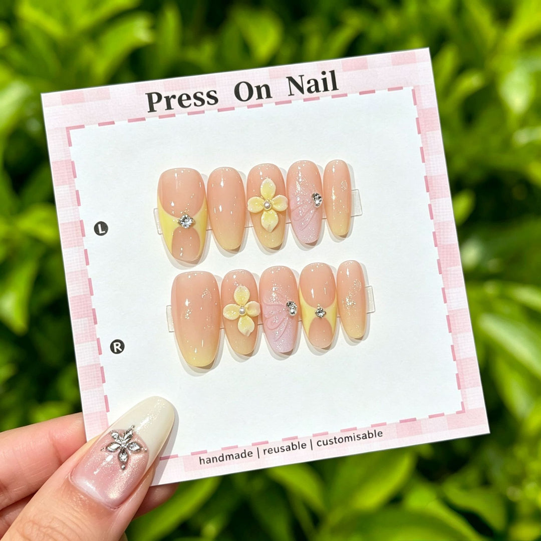 Artistic Press-On Nail Art Set with Cute Character and Bow Accents