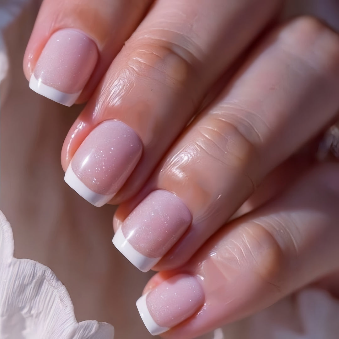 Artificial nails in elegant French tip design Kalsten