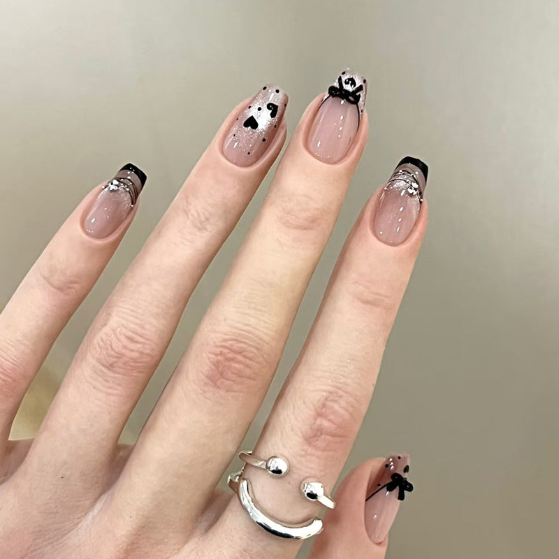 Elegant Artful Nail Design with Bow and Sparkle Accents Kalsten