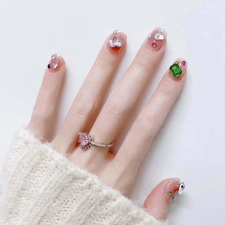 Acrylic nail set with sparkling 3D applications and beautiful heart designs Kalsten