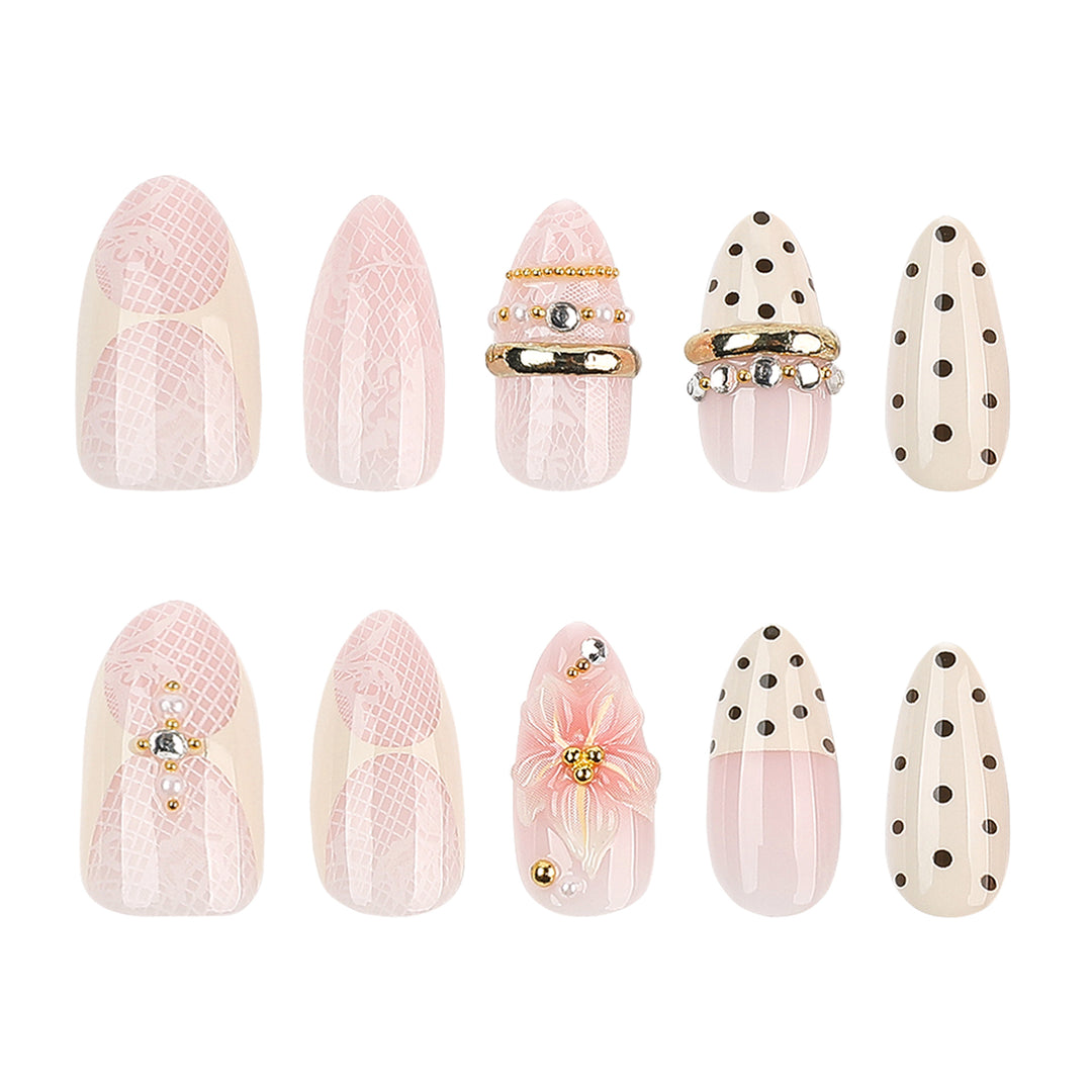 Artful Nail Extensions with Elegant Floral and Glitter Accents Kalsten