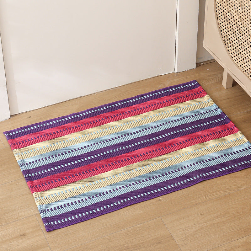 Striped cotton doormat with non-slip bottom and decorative woven edge Kalsten