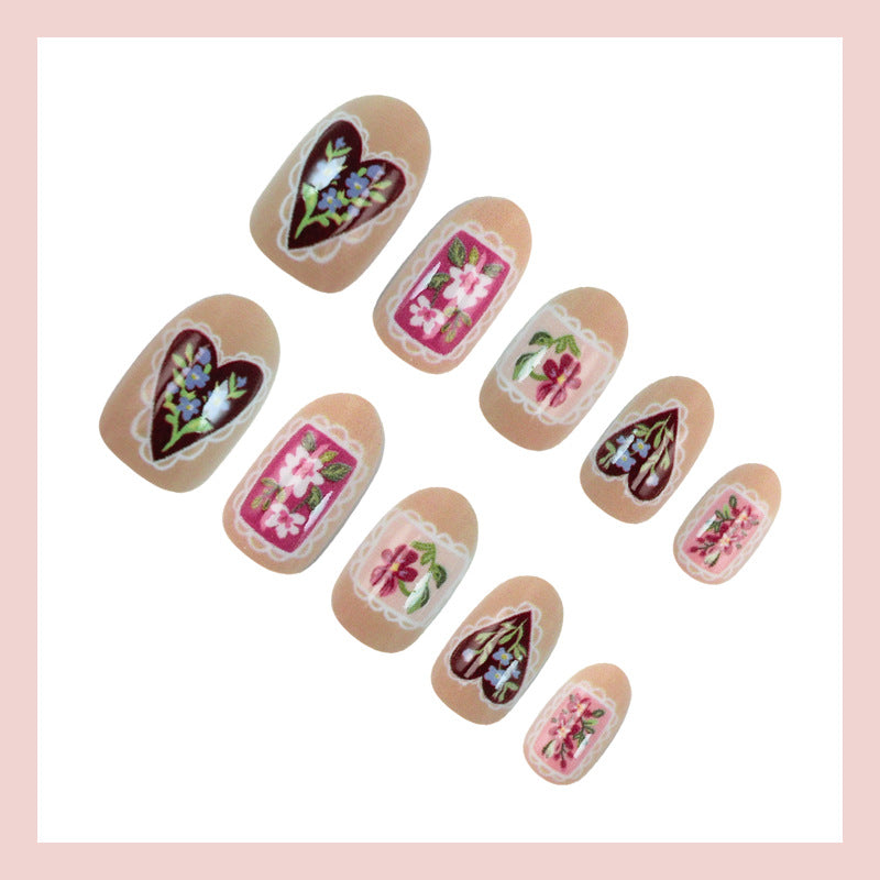 Artificial nail set with floral designs and romantic details Kalsten
