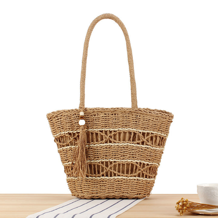 Hand-knotted shopping bag made of natural weave with elegant tassel decoration Kalsten