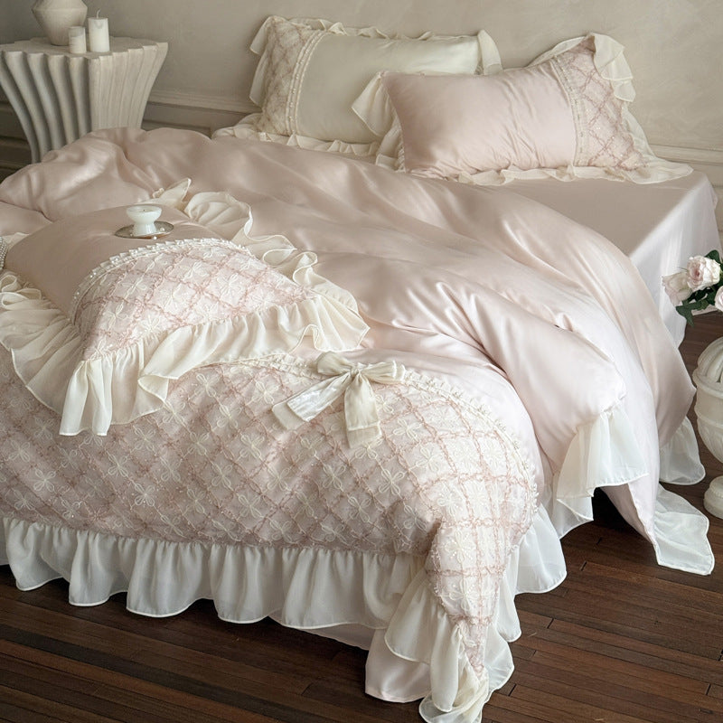 Romantic satin bedding set with ruffle, embroidered lace insert and bow appliqué