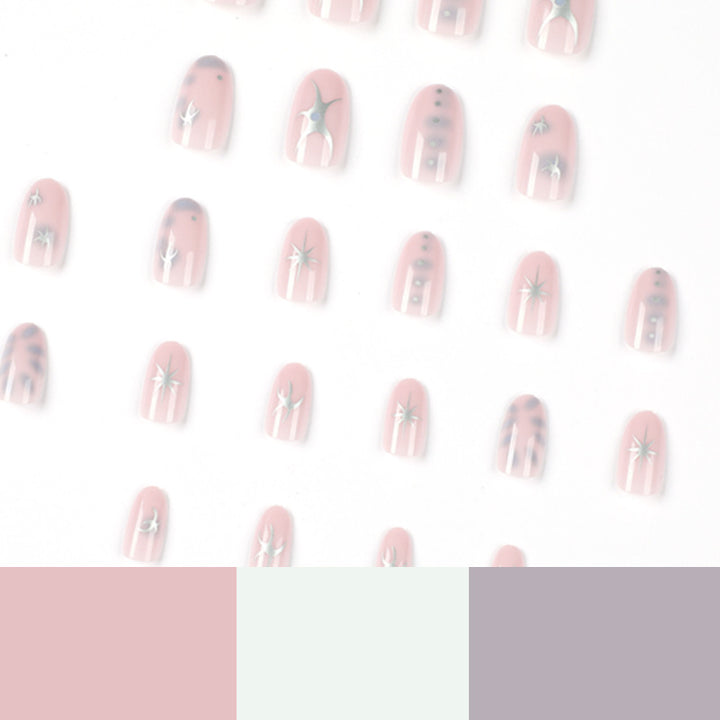 Elegant nail art with glamorous metal embellishments Kalsten