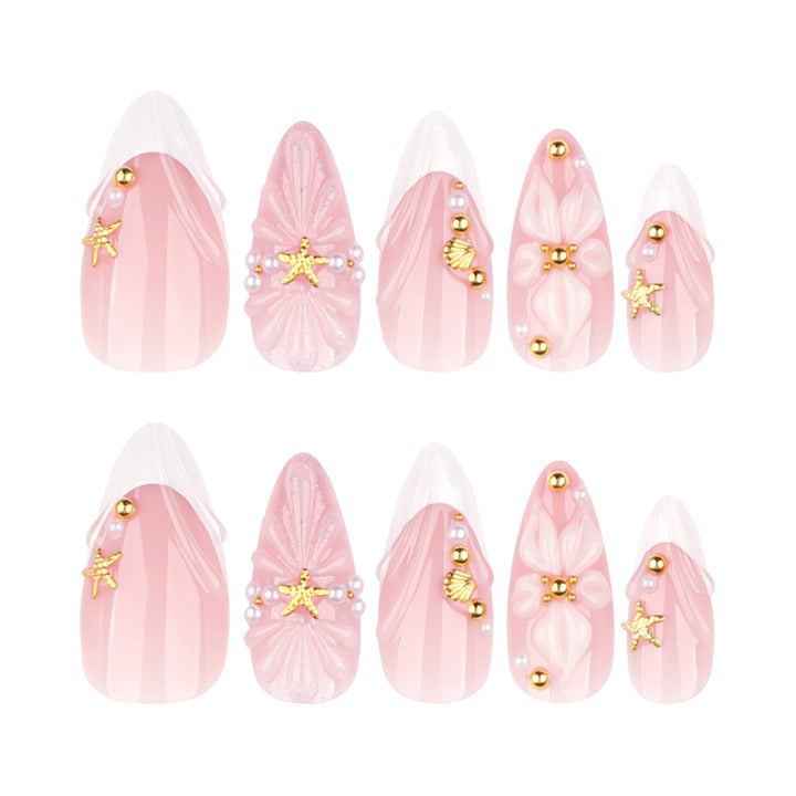 Artful nail art with shell and flower accents Kalsten