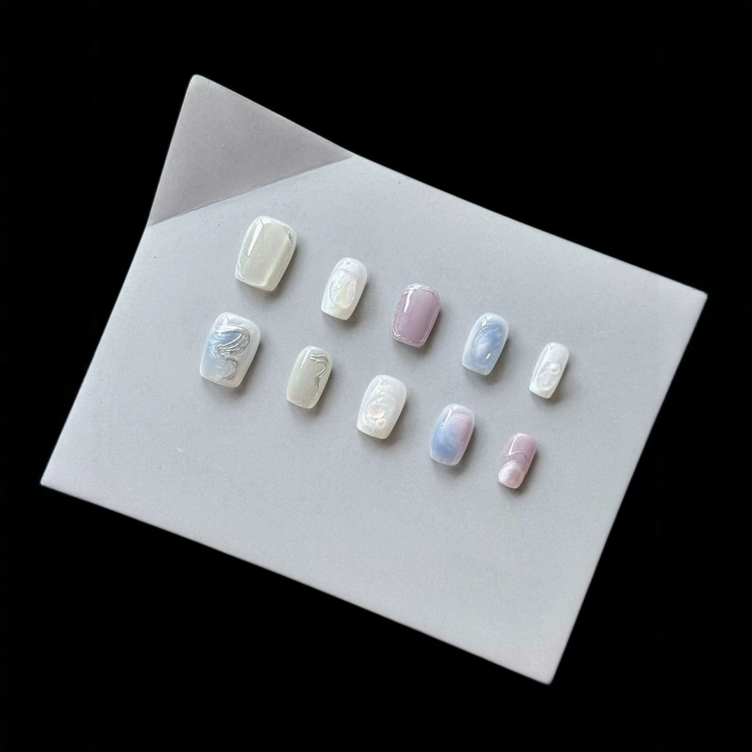 Artistic Press-On Nail Art Set with Pearlescent and Marble Designs