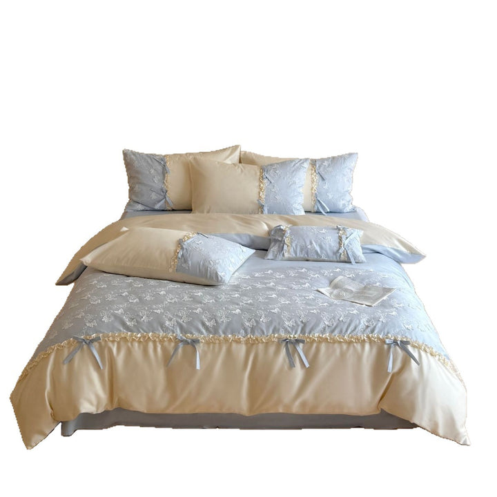Luxurious bedding set with butterfly embroidery, ruffles and decorative bows
