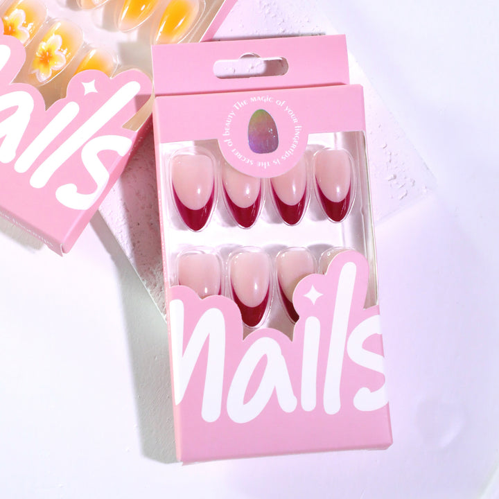 Artistic nail art with floral accents and glossy finish Kalsten