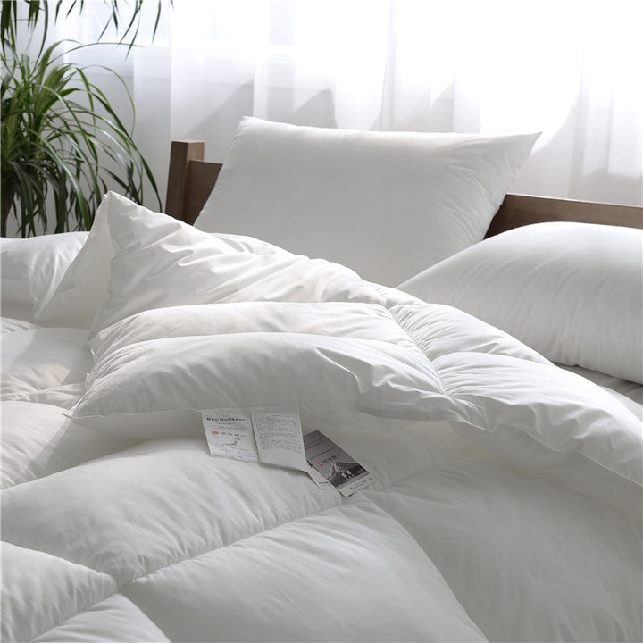 Lightweight all-season duvet with hypoallergenic hollow fiber filling and box chamber quilting