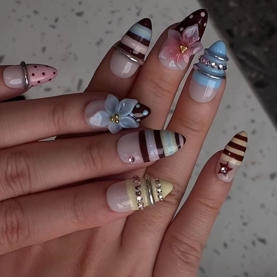 Creative nail art set with floral and striped accents Kalsten