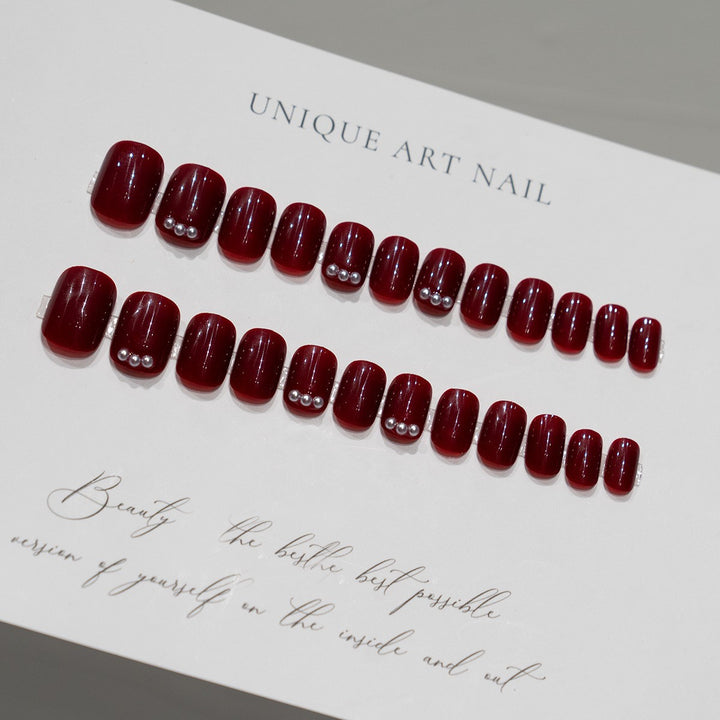 Elegant Glossy Press-On Nails with Rhinestone Accents
