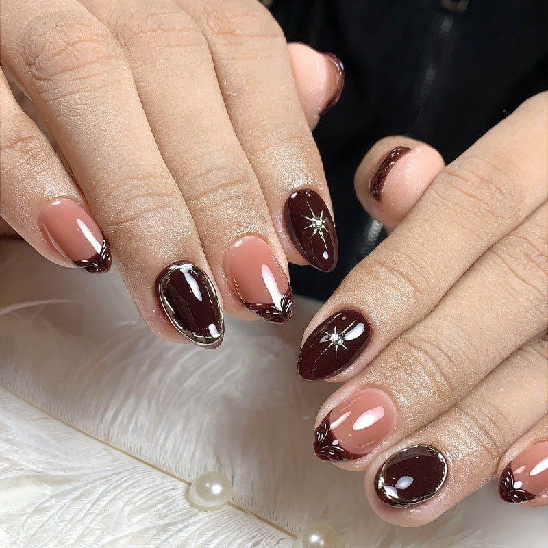 Acrylic nail set with elegant gradient and delicate embellishments Kalsten