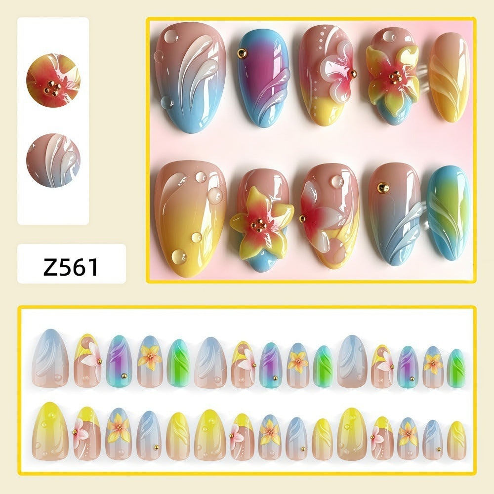 Acrylic nail set with floral elements and colorful accents Kalsten