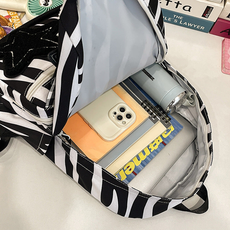 Backpack with Creative Applications and Practical Compartments Kalsten