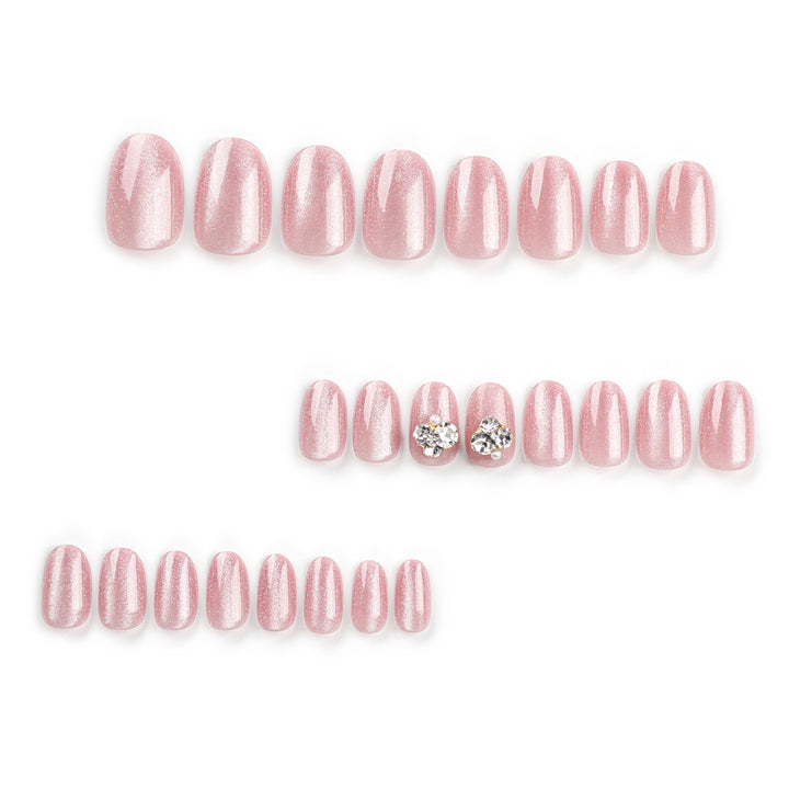 Artful glitter nail extensions with elegant rhinestone accents Kalsten