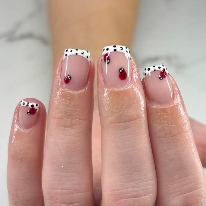 Nail art with cute ladybug designs Kalsten