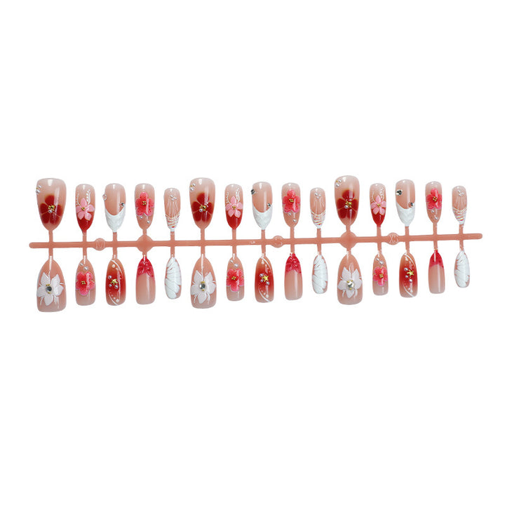 Artificial nail set with floral accents Kalsten