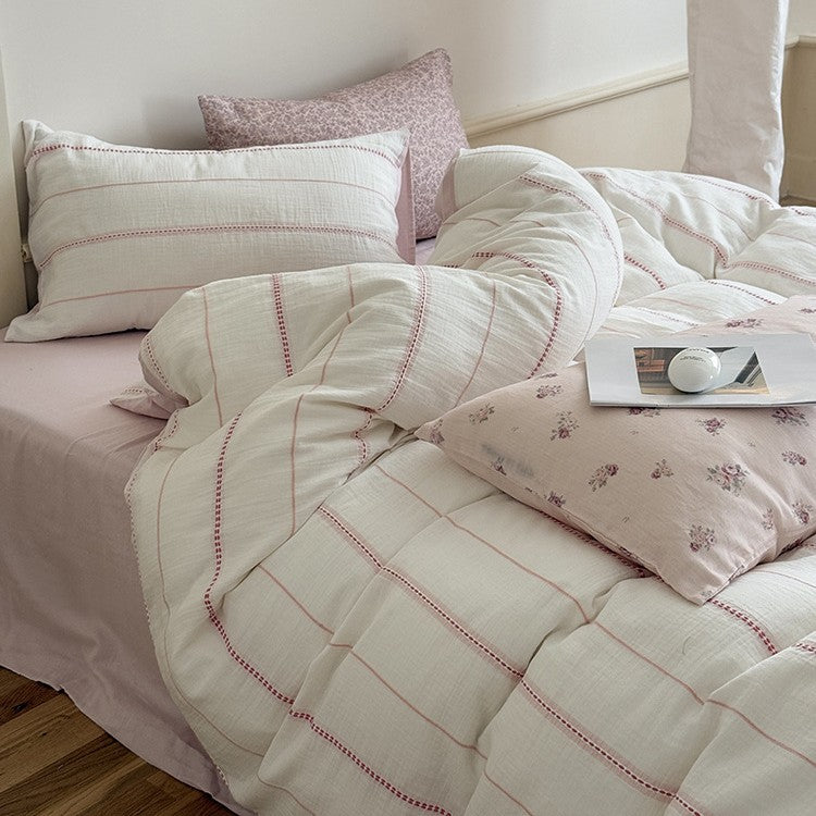 Breathable linen-cotton bedding set with quilted stripes and reversible design