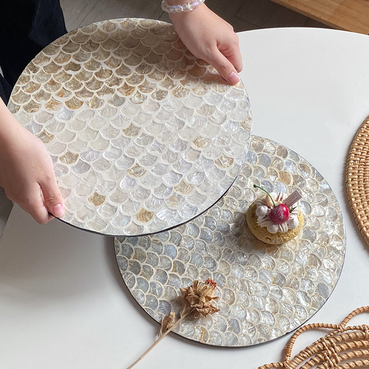 Round serving board made from noble shells Kalsten