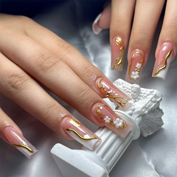 Elegant artificial nail set with golden accents and floral details Kalsten