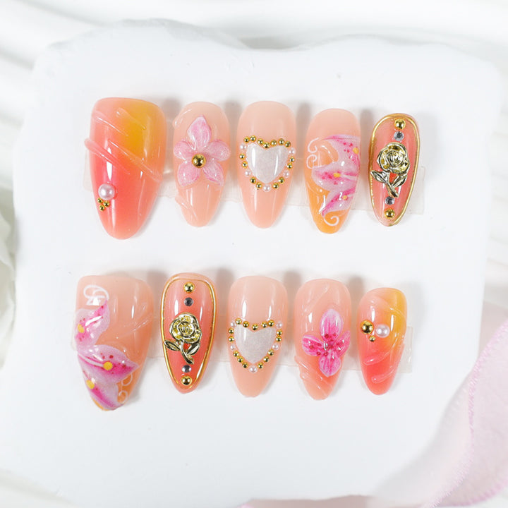Artificial nail set with elegant floral decorations and glitter details Kalsten
