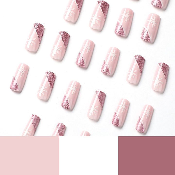 Artful Nail Extensions with Festive Glitter and Snowflake Design Kalsten