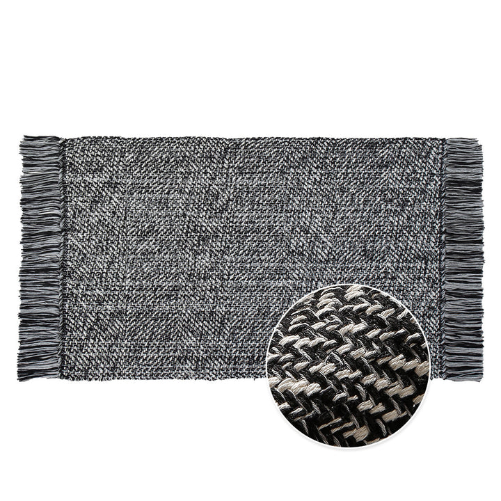Woven table runner made of cotton blend with fine structure and herringbone look as well as decorative fringes Kalsten
