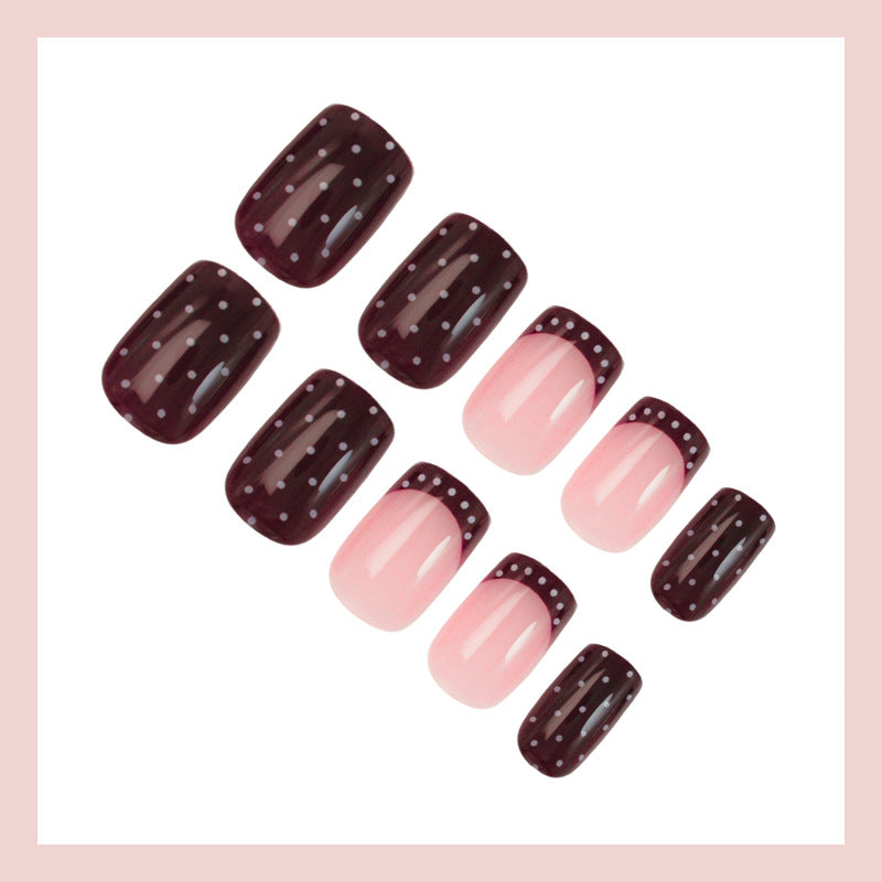 Art nail set with elegant French tips and playful accents Kalsten
