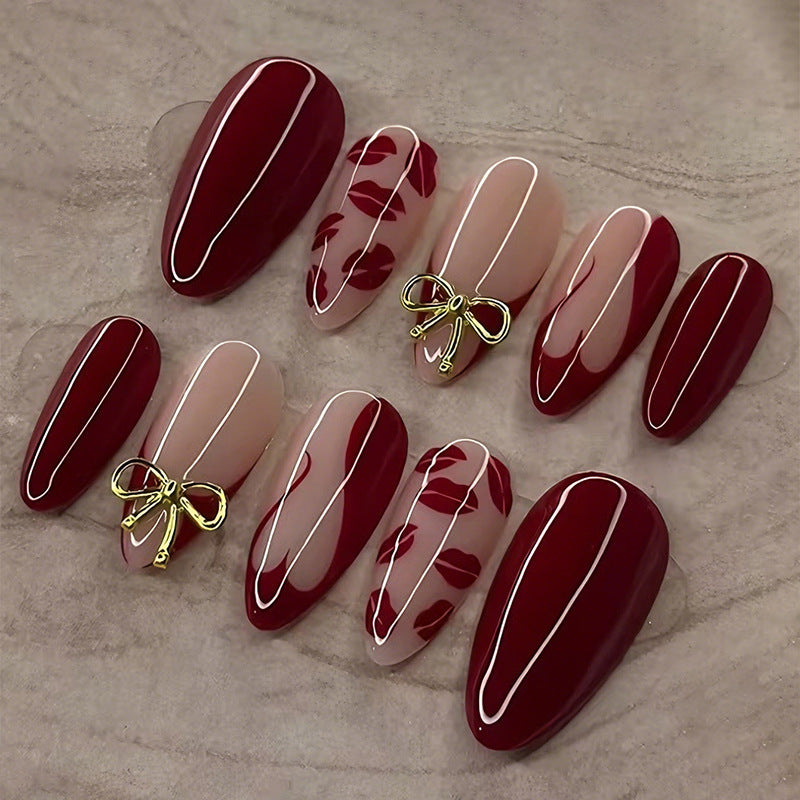 Artificial nail set with elegant bow and kiss mouth designs Kalsten