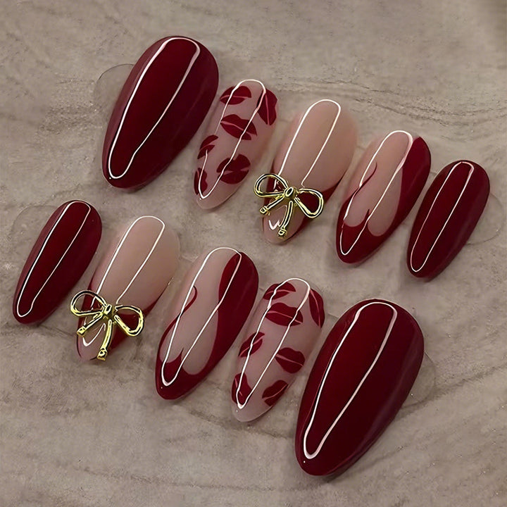 Artificial nail set with elegant bow and kiss mouth designs Kalsten