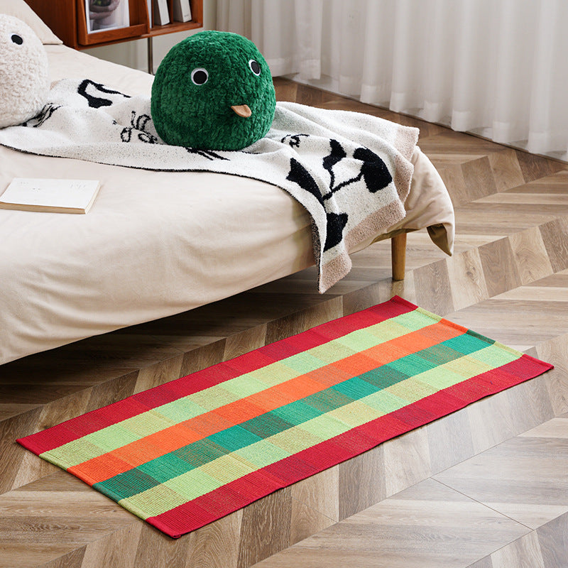 woven living room runner with fringes and geometric weave pattern