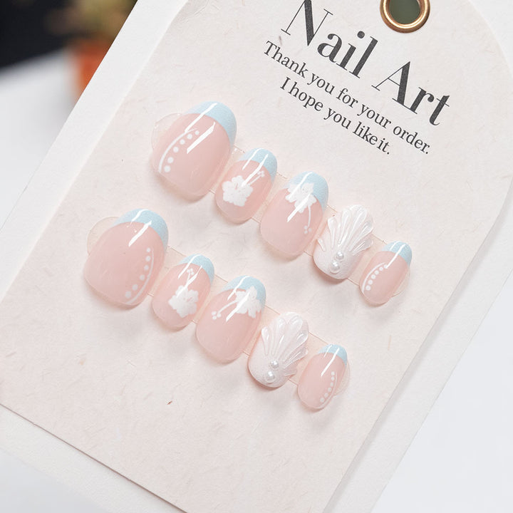 Decorative Press-On Nail Art Set with Floral and Shell Accents
