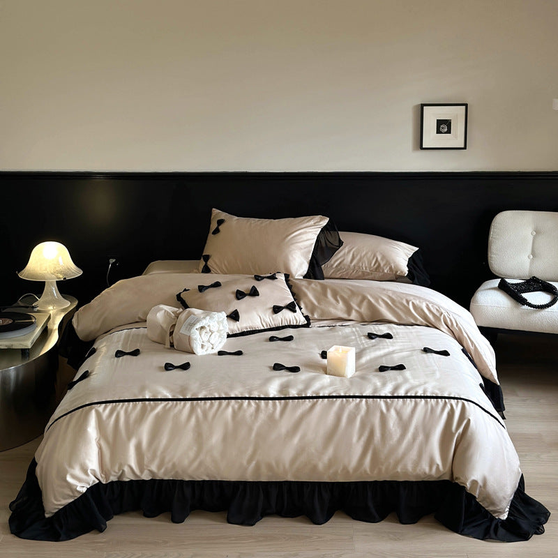 Elegant bedding set made of cotton satin with attached bows and ruffles