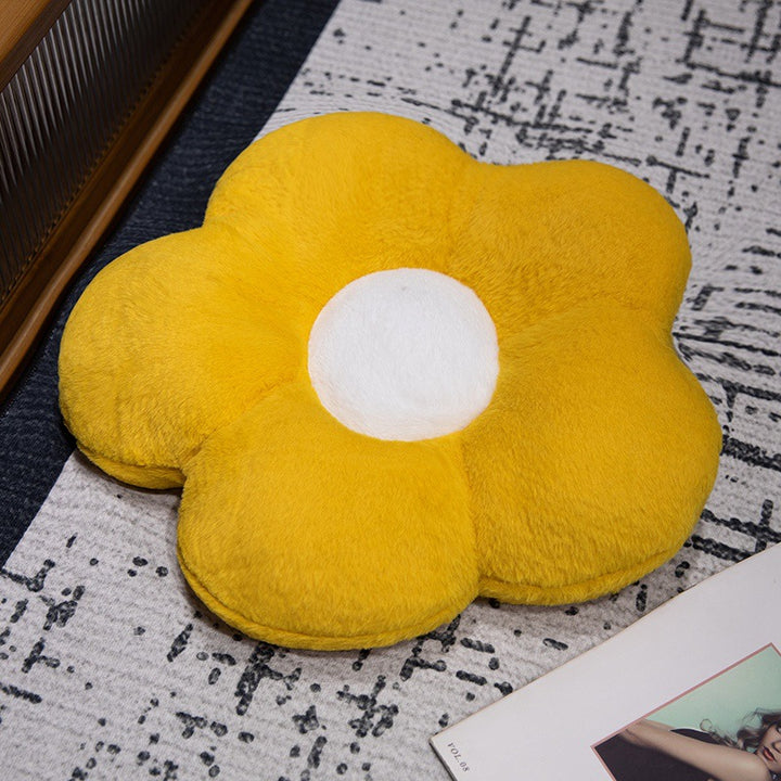 Padded seat cushion in flower shape with faux leather center piece and fluffy edge padding