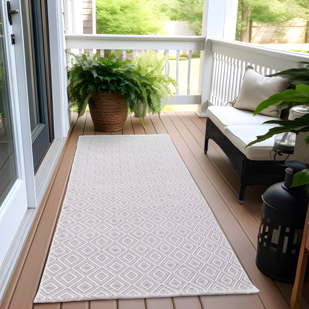Modern runner made of handwoven cotton with geometric diamond pattern