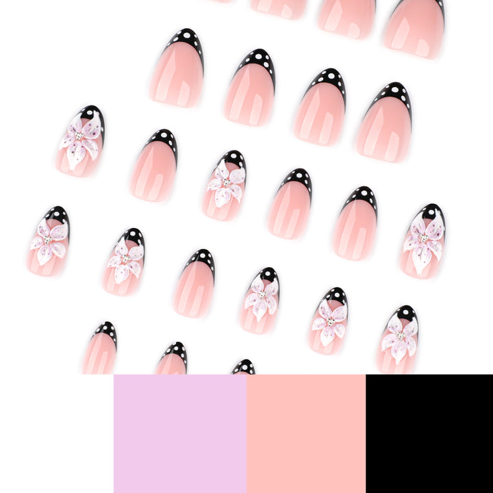 Artistic nail art with floral designs and elegant accents Kalsten