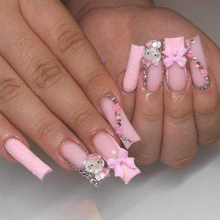 Glamorous artificial nail set with sparkling rhinestone embellishments and creative animal designs Kalsten