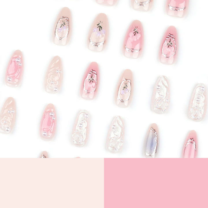 Artful nail extensions with elegant flower decoration Kalsten